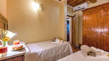 Apartment, 2 Bedrooms, Smoking, Pool Access | 2 bedrooms, individually furnished, free WiFi, bed sheets