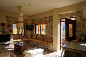 Premium House | Living area | 32-inch flat-screen TV with digital channels, LCD TV, fireplace