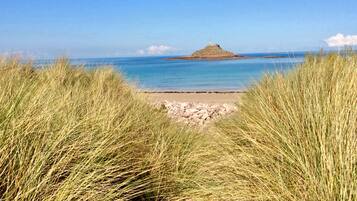On the beach, sun loungers