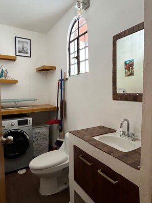 Shower, hair dryer, towels, toilet paper
