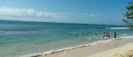 On the beach, sun-loungers, beach towels