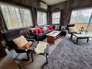 Smart TV, fireplace, DVD player, books