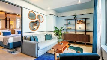 Suite, uitzicht op tuin | Luxe beddengoed, pillowtop-bedden, een minibar, een kluis op de kamer