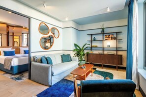 Suite, uitzicht op tuin | Luxe beddengoed, pillowtop-bedden, een minibar, een kluis op de kamer