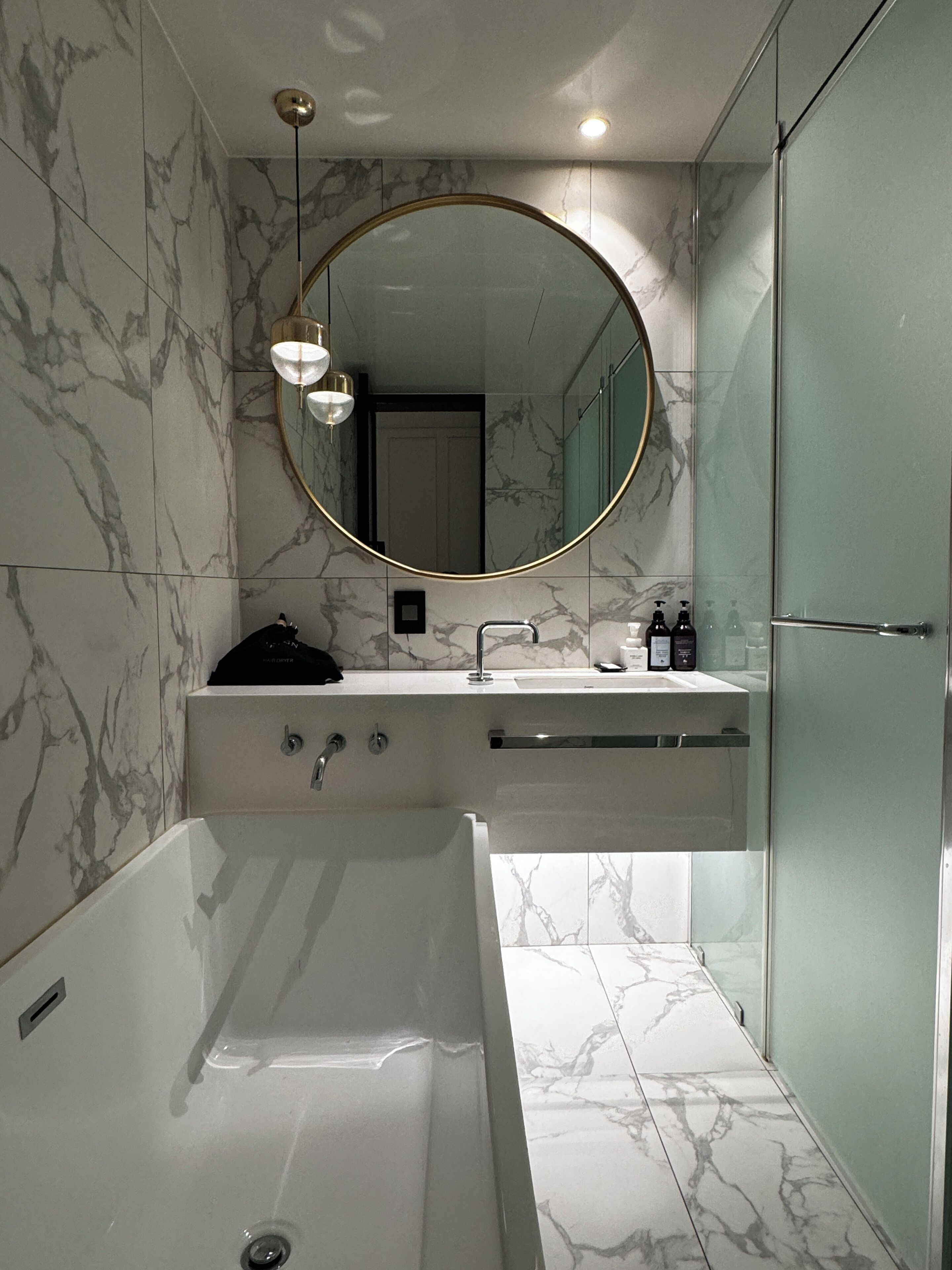 standard double room | bathroom amenities | separate bathtub and shower, free toiletries, hair dryer, slippers