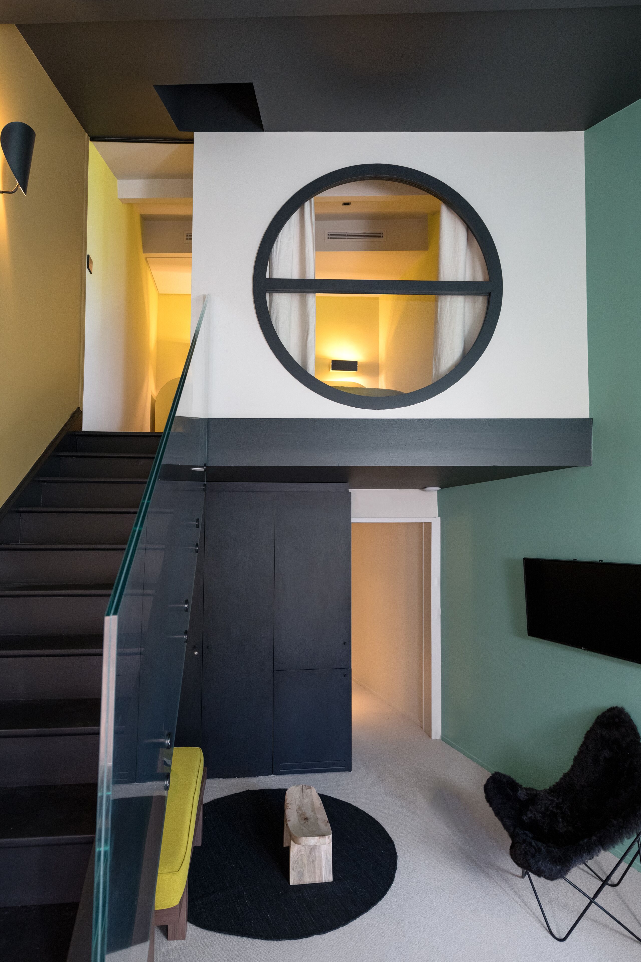 suite supérieure acquaverde, 22 rue du boeuf 69005 lyon | living area | flat-screen tv