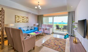 3 Bedroom Chalet Sea View | Living area | 43-inch Smart TV with digital channels, TV, fireplace