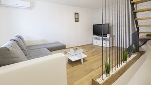 Departamento, 3 habitaciones | Área de sala de estar