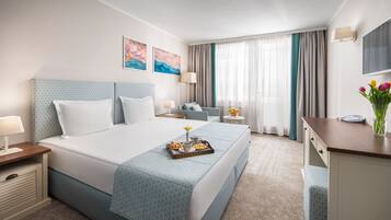 Classic Double or Twin Room | Minibar, in-room safe, desk, laptop workspace