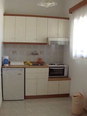 Apartment, 2 Bedrooms | Private kitchenette | Mini-fridge, oven, stovetop, toaster