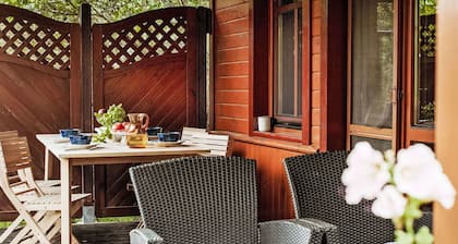 Joli appartement dans une maison de vacances avec climatisation, TV, terrasse et animaux admis