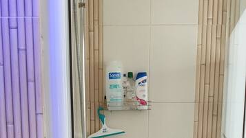 Shower, eco-friendly toiletries, hair dryer, towels