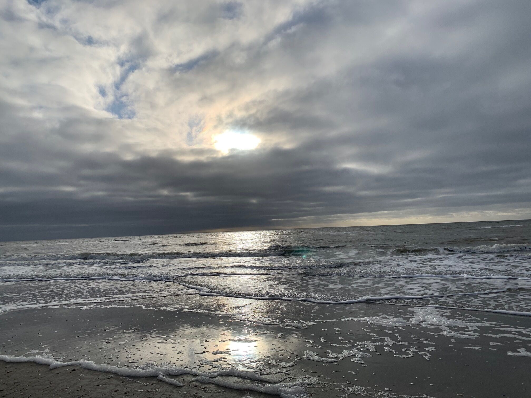 Nær stranden og solsenger