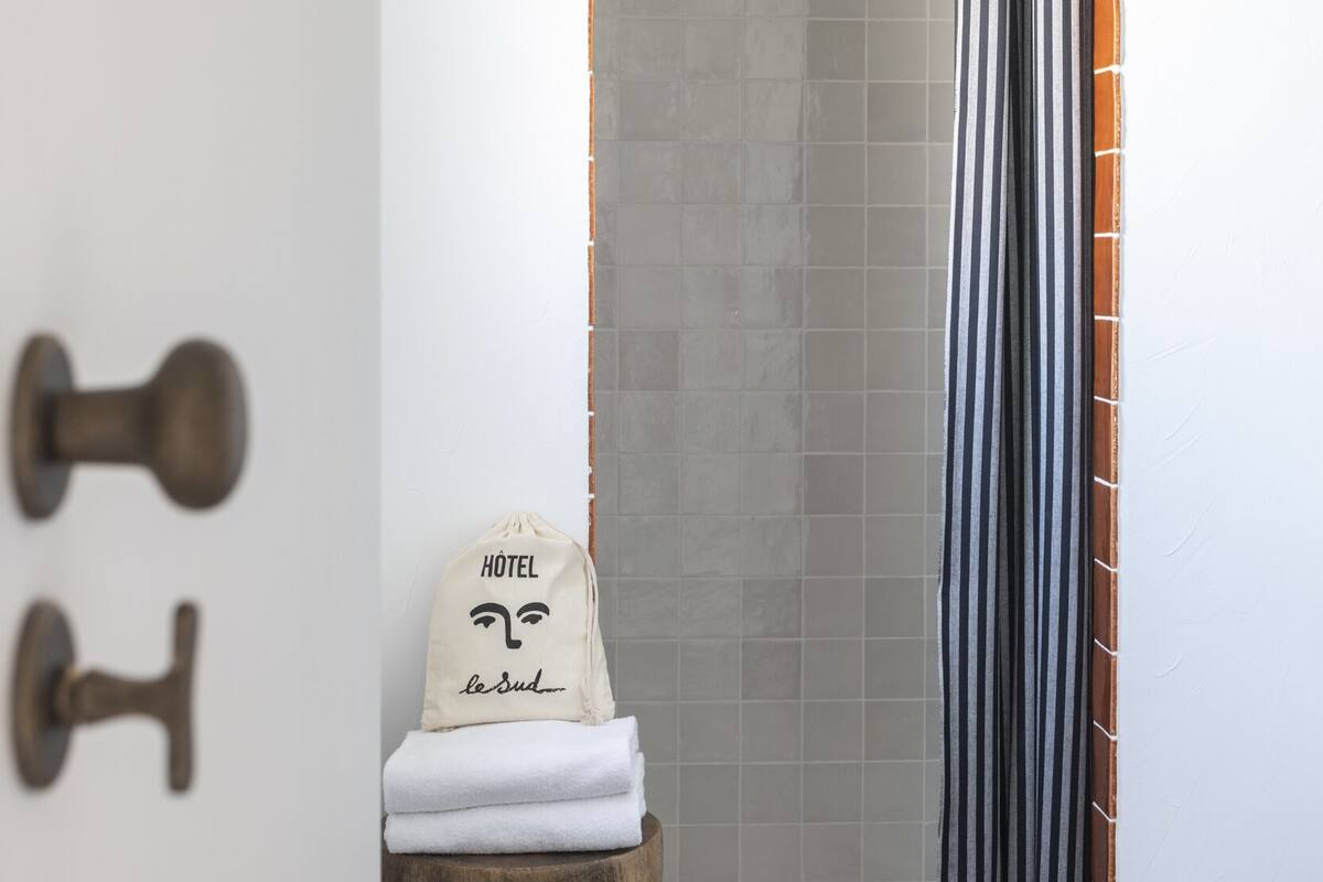 standard double or twin room, garden view | bathroom | hair dryer, towels
