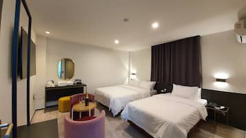 Premium-værelse med 2 enkeltsenge | Premium-sengetøj, senge med madrasser af memory foam, minibar