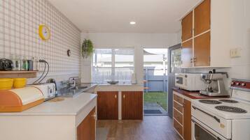 Fridge, microwave, toaster, cookware/dishes/utensils