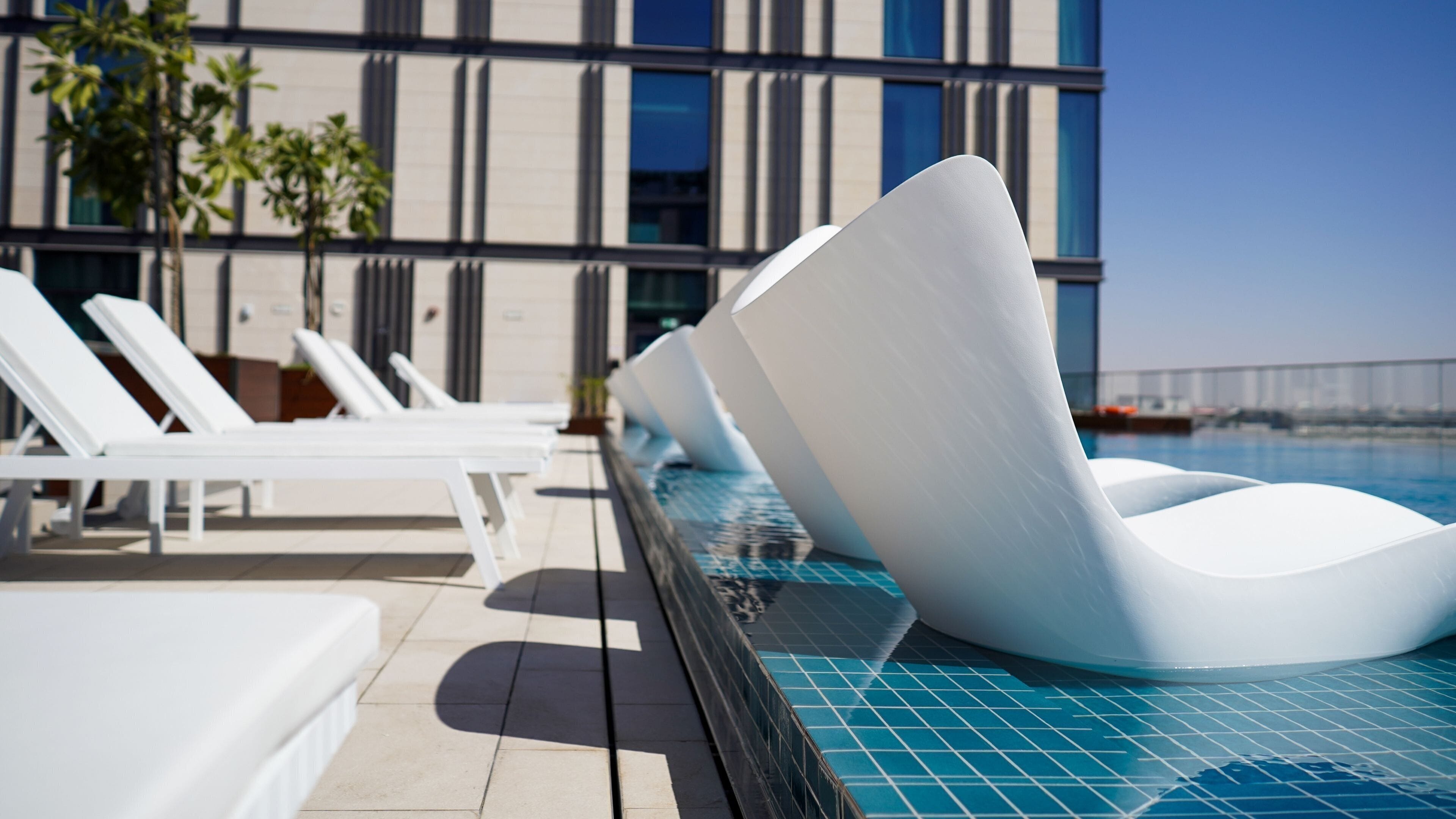 outdoor pool, pool loungers