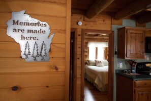 4 bedrooms, iron/ironing board, free WiFi, bed sheets - Beautiful log home with wrap-around deck surrounded by trees. (Egg Harbor)