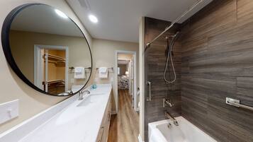 Bathtub, hair dryer, towels