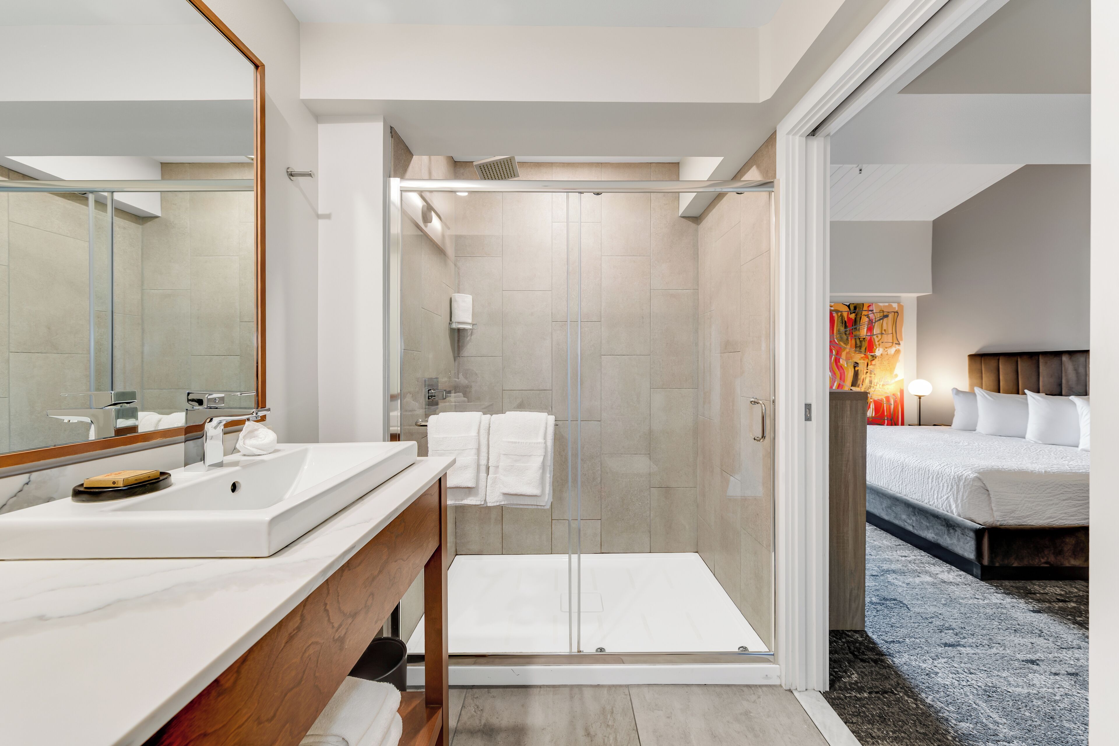 Shower, rainfall showerhead, designer toiletries, hair dryer