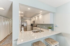 Fridge, microwave, oven, stovetop - Resting Beach Place managed by Beach Retreats FL Anna Maria Island (Holmes Beach)