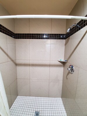 Shower, towels, soap, shampoo