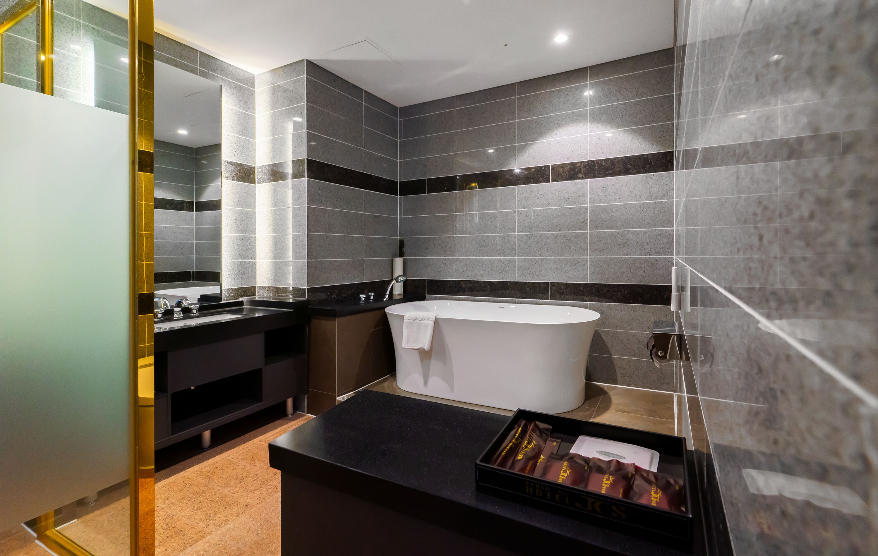 hair dryer, bathrobes, slippers, bidet