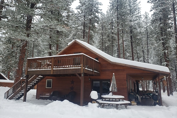 View from out front. Upstairs deck and entrance to loft apartment can be seen.