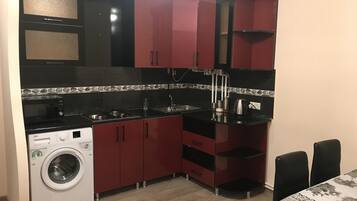 Réfrigérateur, plaque de cuisson, cafetiÚre/bouilloire