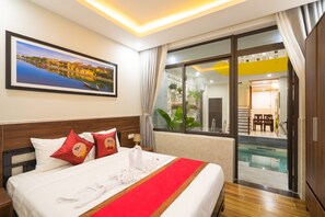 In-room safe, desk, laptop workspace, blackout curtains - The Lit Villa (Da Nang)