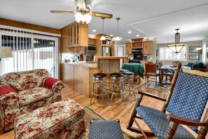 Smart TV, fireplace, video game console, books