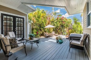Outdoor dining - Lotus Blossom: Discover Paradise, 3BR Home W/ Tropical Courtyard, Hot Tub & Minutes from Old Town! (Key West)