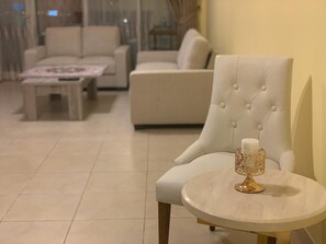 Family Apartment, 2 Bedrooms, Non Smoking | Living room | Flat-screen TV - Downtown 2bedroom Holidays R Us (Dubai)