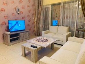 Family Apartment, 2 Bedrooms, Non Smoking | Living room | Flat-screen TV - Downtown 2bedroom Holidays R Us (Dubai)