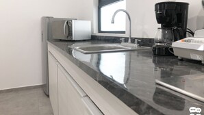 Deluxe Condo, City View | Private kitchen | Coffee/tea maker, fridge, microwave, cookware/dishes/utensils - Marina Solé Dep 1 (J-5) (Mazatlán)
