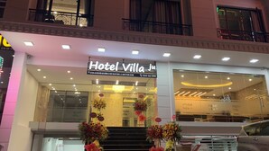A hotel entrance with a sign reading "Hotel Villa Ju". - Hotel Villa Ju (Hanoi)