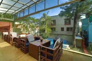 Breakfast, lunch, dinner served; pool views