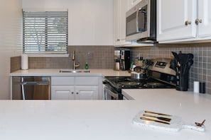 Condo, 2 Bedrooms | Private kitchen | Fridge, microwave, oven, dishwasher