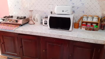 Fridge, microwave, electric kettle, toaster