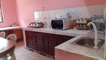 Fridge, microwave, electric kettle, toaster