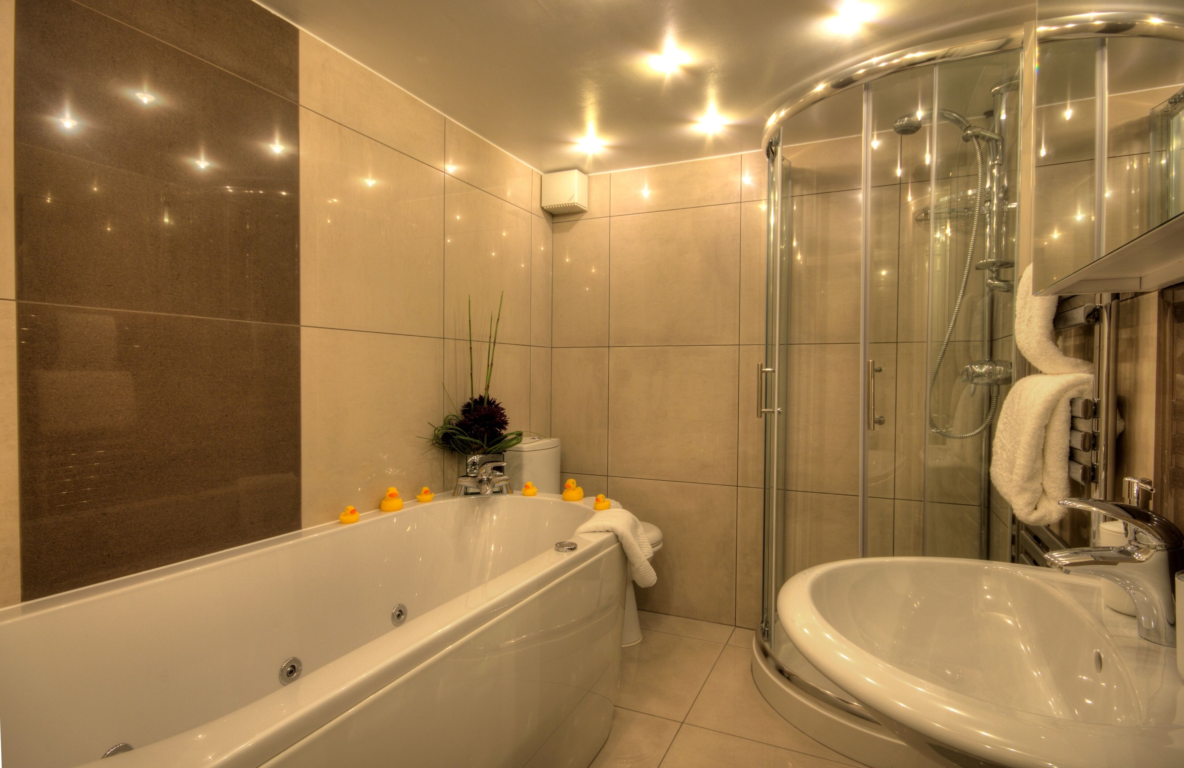 Bathtub, hair dryer, towels, soap