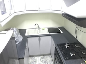 Microwave, coffee/tea maker, cookware/dishes/utensils