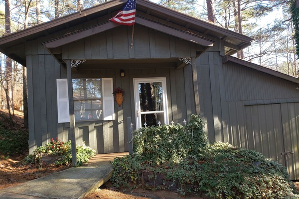 our one bedroom cottage is cozy with fireplace and flat screen TV in living room