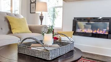 TV, fireplace, books