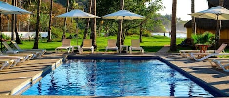 Outdoor pool, open 9:00 AM to 9:00 PM, sun loungers