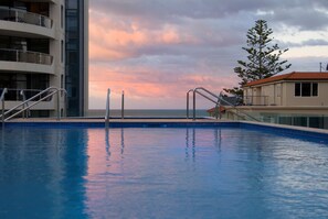 Outdoor pool, a heated pool - Chic and Modern Mount Maunganui Apartment (Mount Maunganui)