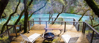 Riverfront getaway with a private beach, great views, & fantastic fishing