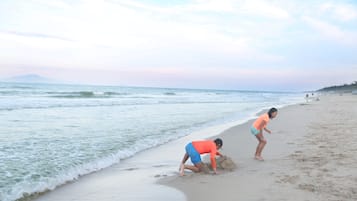 Beach umbrellas, beach towels, beach yoga