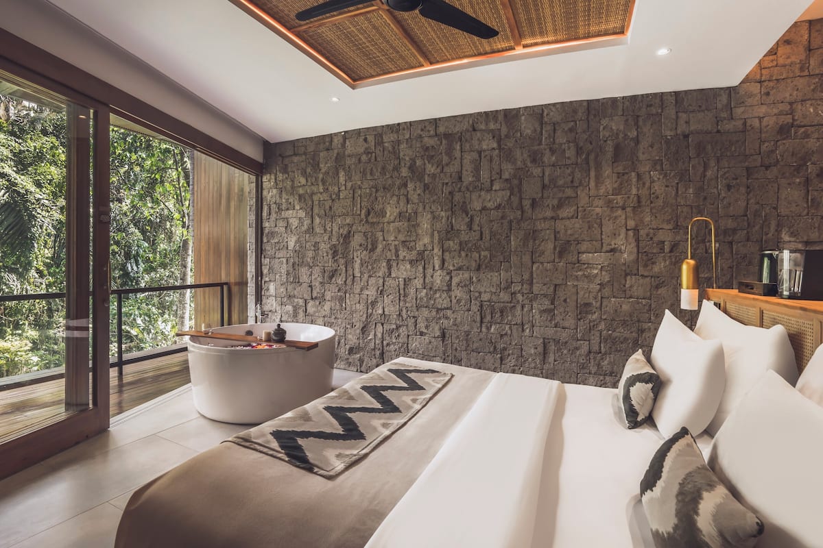 Grand Suite with Forest View | Hypo-allergenic bedding available, minibar, in-room safe, desk