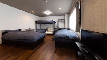 Family Room with Private Bathroom | Down comforters, blackout drapes, free WiFi